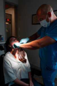 Dr-Diaz-NJ-Oral-Surgeon-Examines-Patient